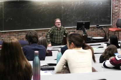 Jed Mayer, associate professor of English, leads a discussion of the film Isle of Dogs.